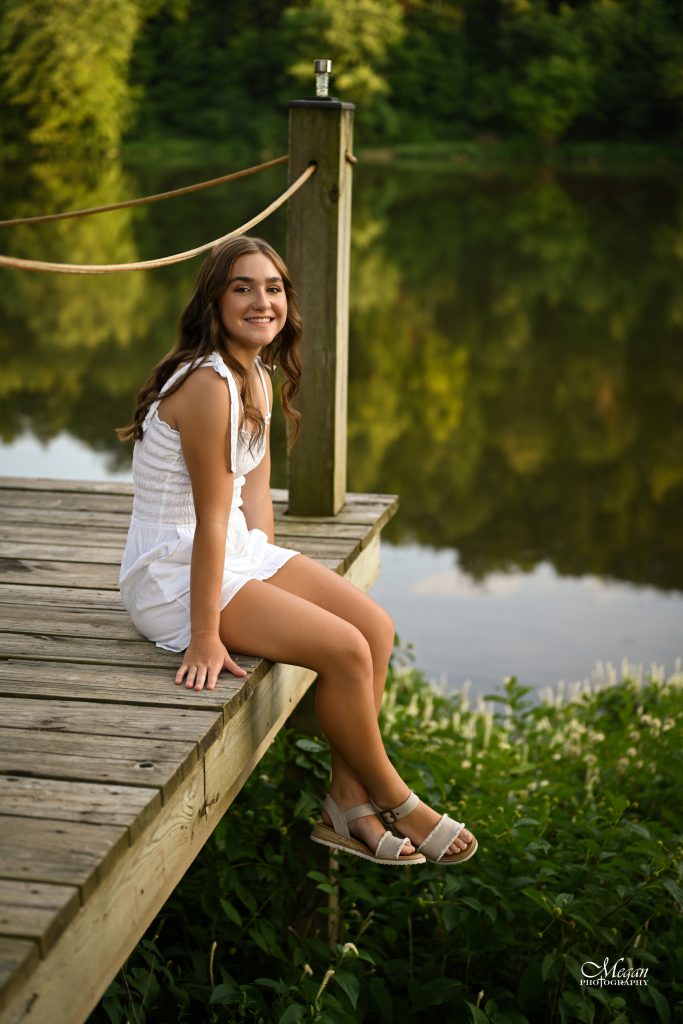 What Are Senior Pictures? Girl on a dock